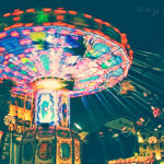 This was hand-held at 1/25th of a sec. I wanted much slower shutter speed for this shot, but didn't have my tripod with me (never leave home without it at night). :-)
E6 to C41 digital Cross Processing effect applied.